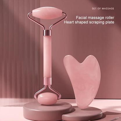 Facial massage roller with heart-shapedJade Roller for Face on a pink background