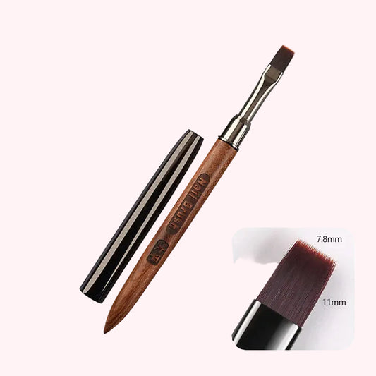 Makeup brush with wooden handle and metal ferrule on a white background