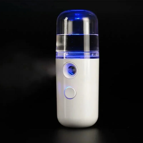 Portable Facial Humidifier Mist  with blue light on a black background