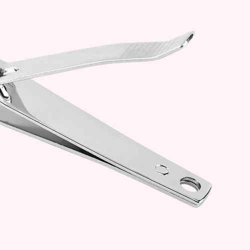 Metallic nail clipper on a white background